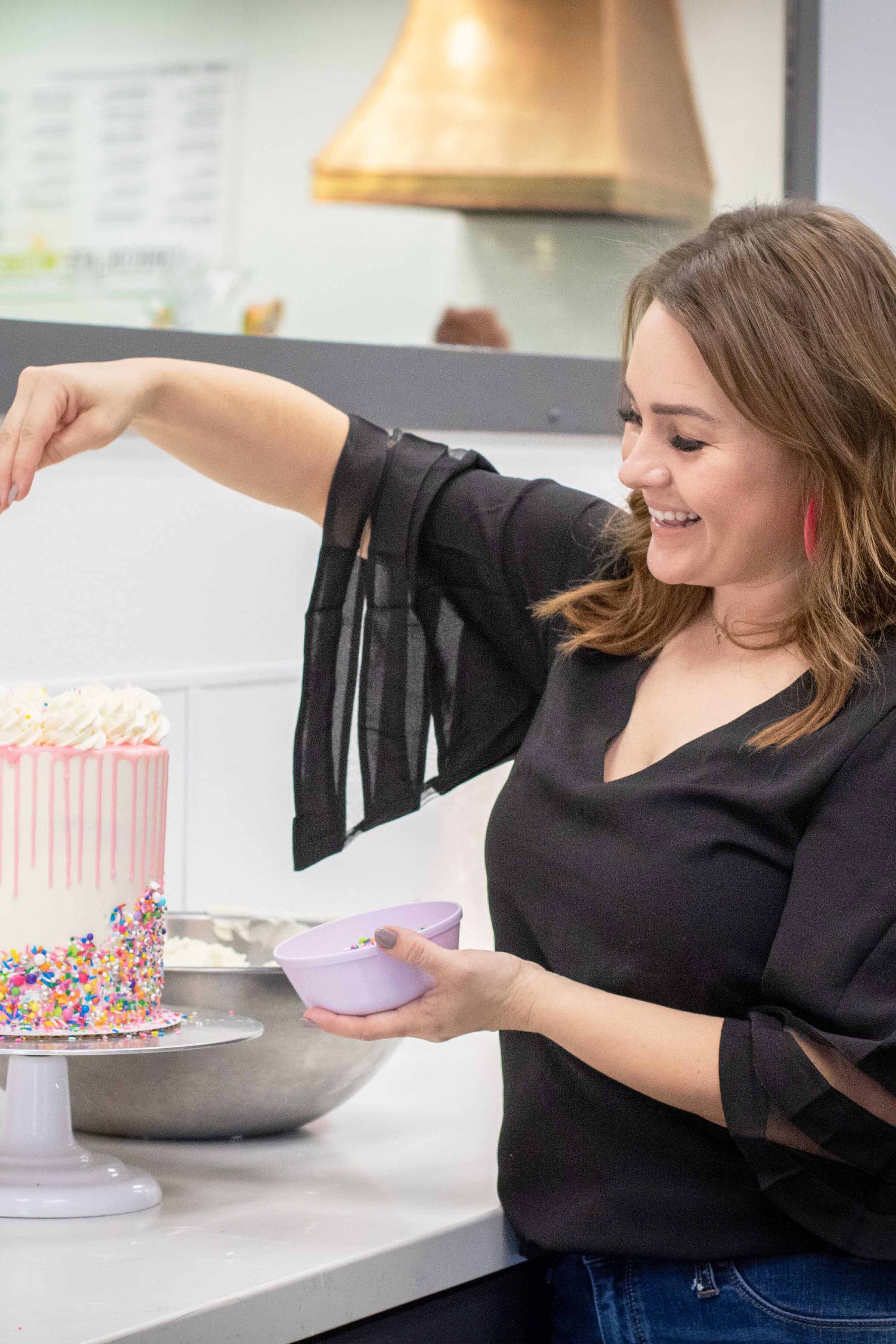 Producers Chef Ambassador decorating a cake