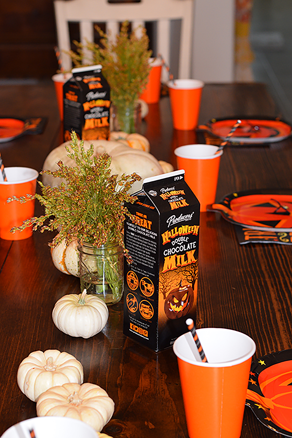 Halloween Double Chocolate Milk on a halloween decorated table.